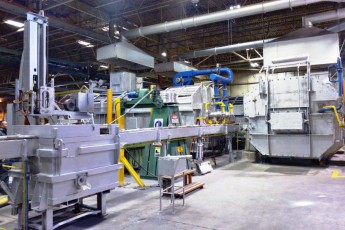 Melting and continuous casting section in an aluminium slug plant