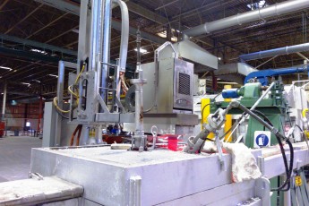 Melting and continuous casting section in an aluminium slug plant